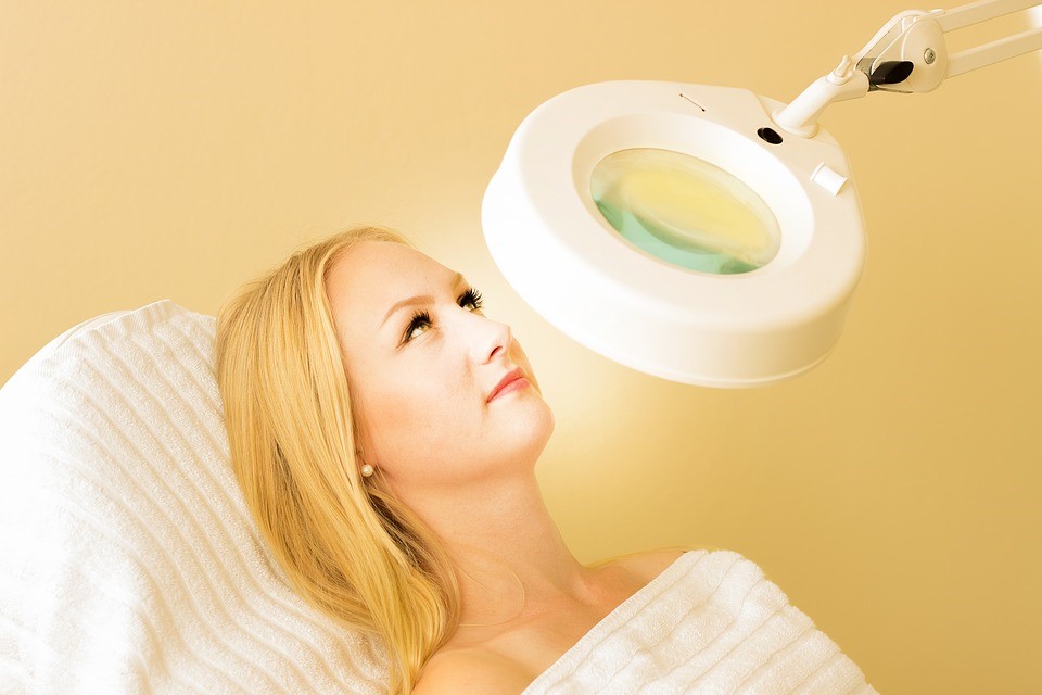 A woman with glowing skin after getting an oxygen facial