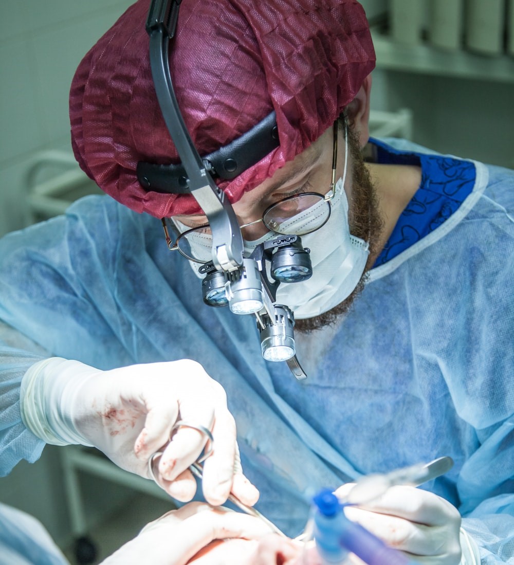 A plastic surgeon doing a thread lift procedure